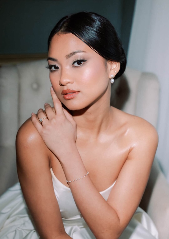 soft glam neutral bridal makeup on a bride in her wedding dress.
